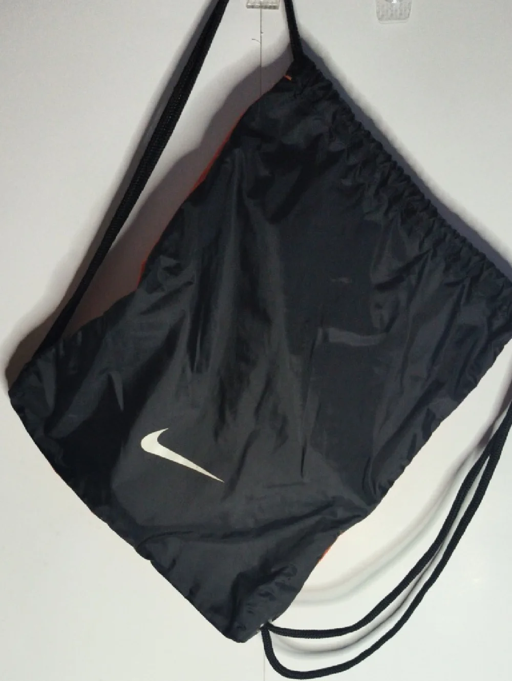 Nike Orange And Black Reversible Drawstring Backpack with White Swoosh